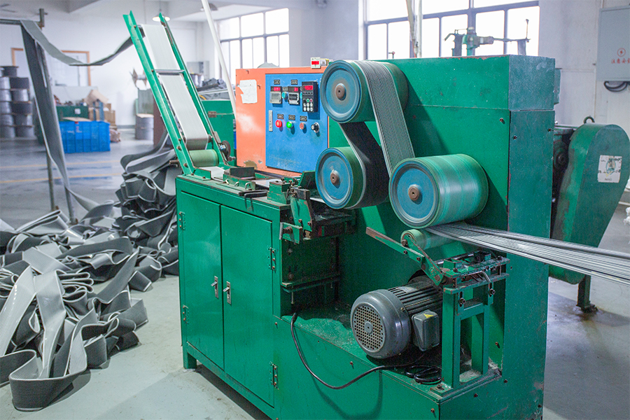 Close view of production equipment used for weatherstrip sample preparation