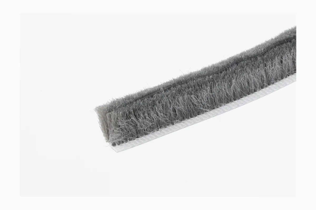 Grey aluminum window brush seal sample for sliding profile matching